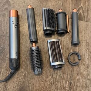 599$ Dyson Airwrap Complete Long in Nickel and Copper with Six Attachments